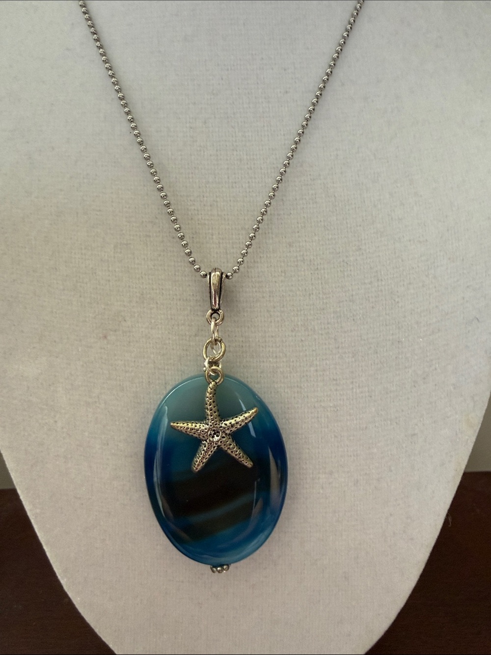 Ocean Hues Blue Oval agate Pendant Necklace with Silver Starfish Charm.